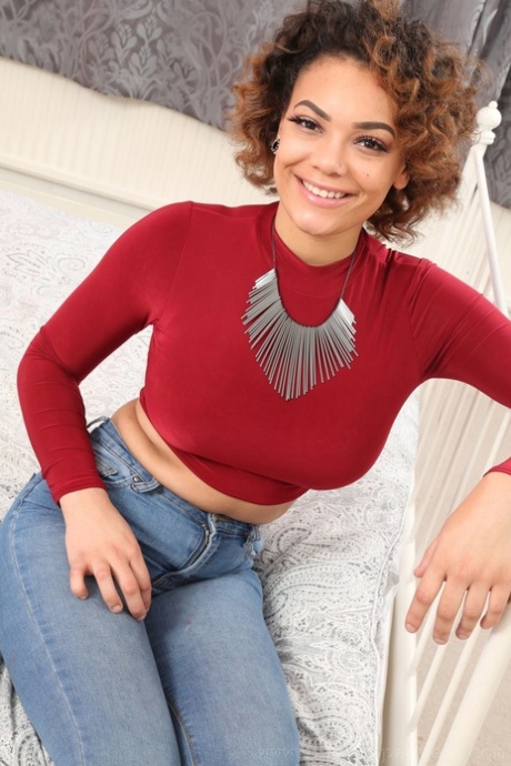 Solo girl Billie C looses her big boobs from a sweater and bra in pantyhose